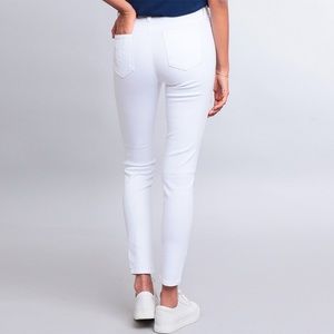 White mid rise skinny jeans